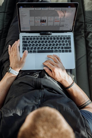 A guy using his laptop