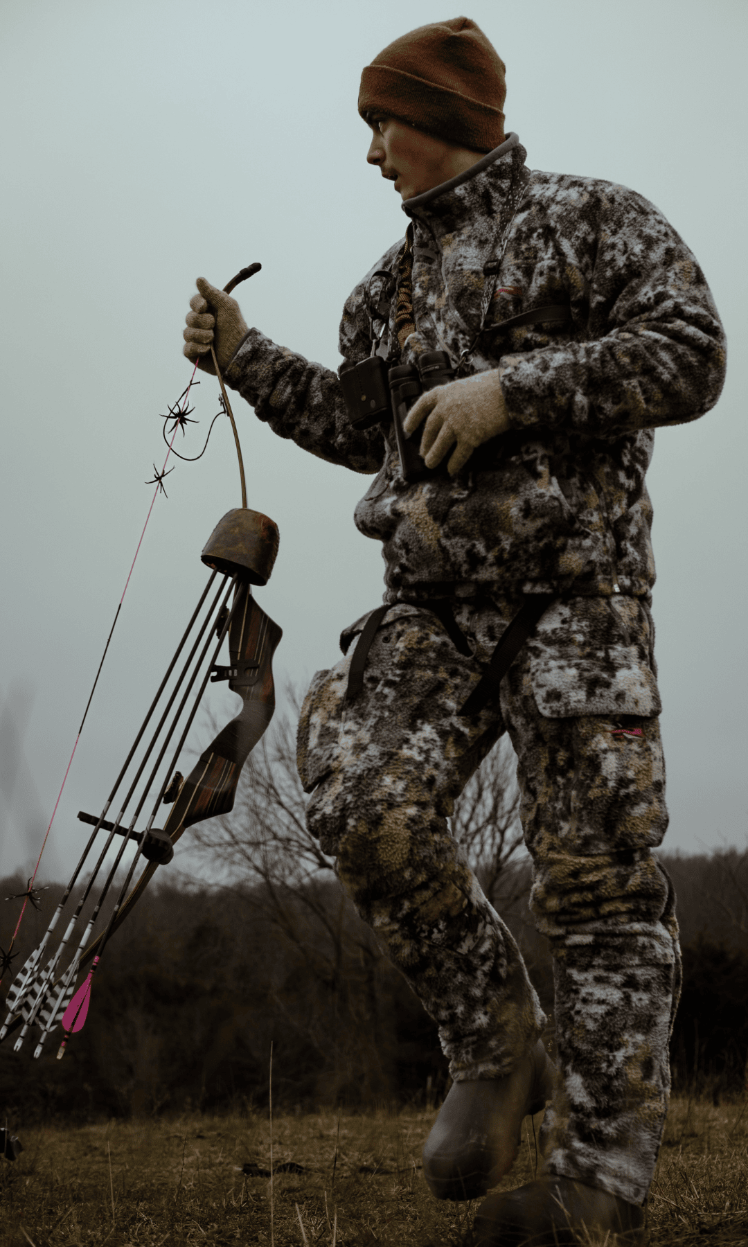 man bow hunting