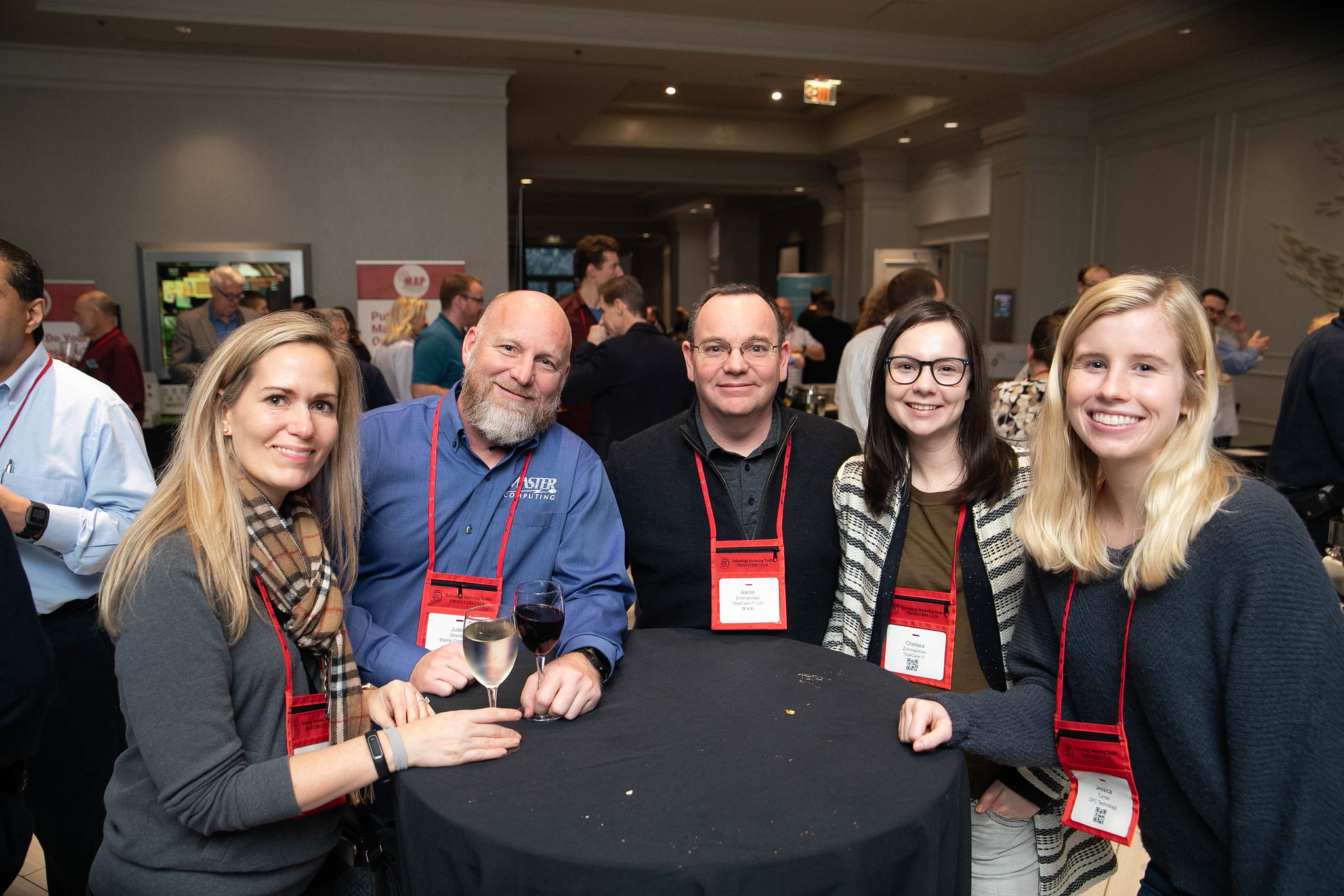 TotalCare IT employees at a conference