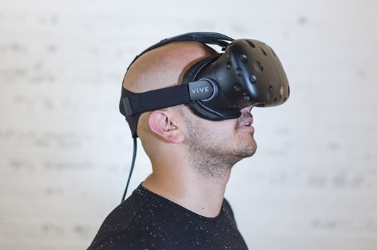 A guy wearing a VR